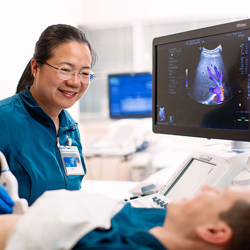 Sonography student at Mayo Clinic performs an ultrasound on a patient